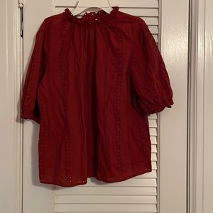 Red crew neck blouse